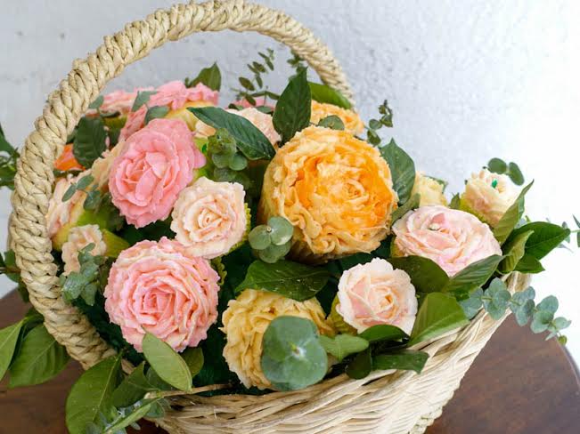 Jinky's favorite flower to frost on a cupcake is the English rose. She mixes different hues of frosting to get the petals to look like real roses. You can request a specific flower and Jinky can customize a bouquet for you. Photo by Jinky Yamsuan