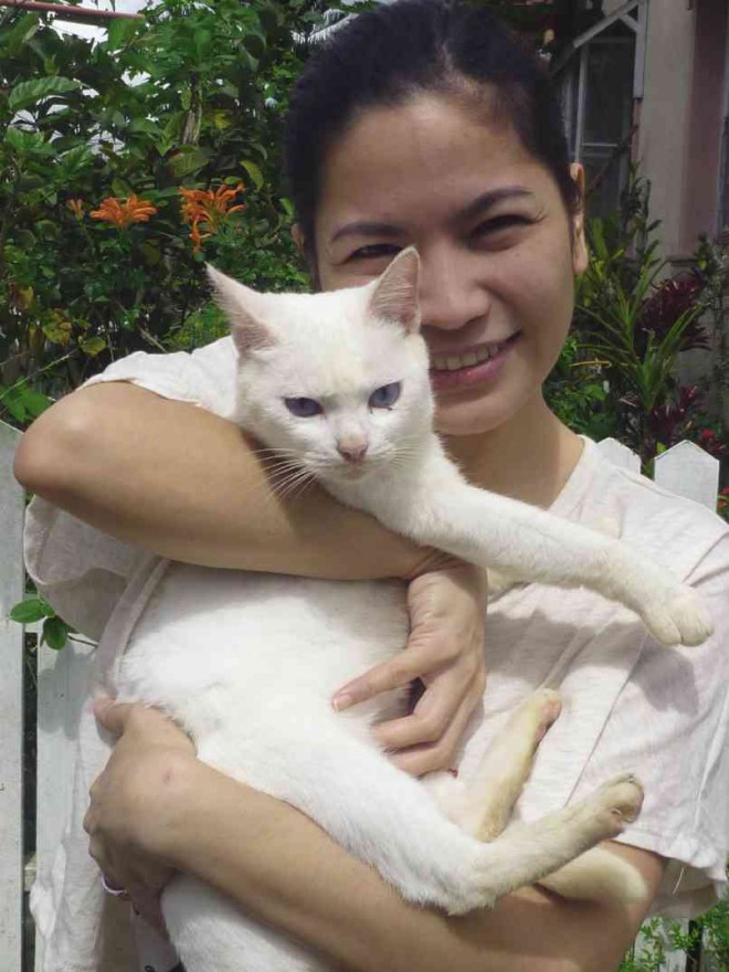 EDITORIAL production assistant Tash Verayo-De Villa with cat Beautiful