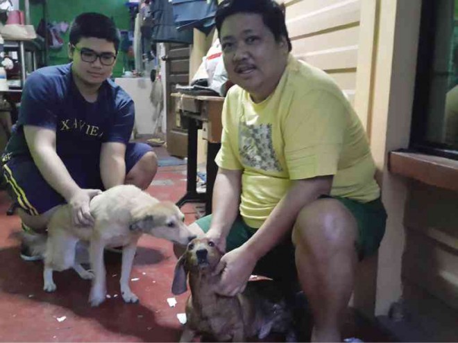 LIBRE editor in chief Chito dela Vega with son Luliboy and dogs Doglas and Tiny