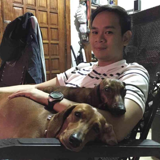 EDITORIAL production assistant Jun Veloira with Star and Penguin
