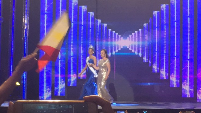Miss Universe Pia Wurtzbach is joined on stage by former Miss Universe Margie Moran-Floirendo during her homecoming on Thursday at the Smart Araneta Coliseum. YUJI VINCENT GONZALES