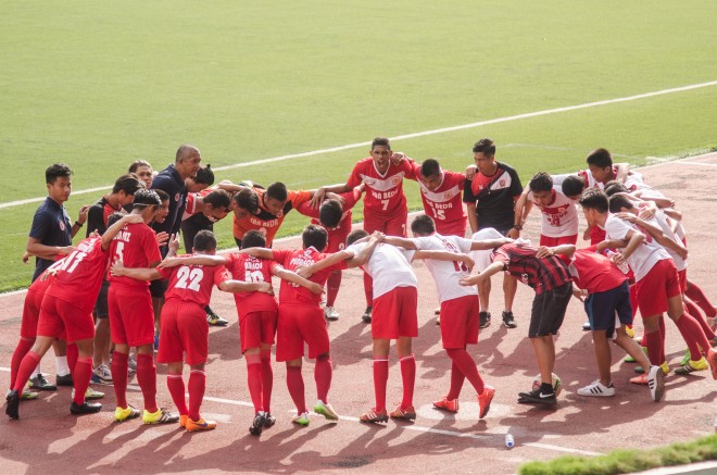 PUMPING themselves up, the San Beda juniors football team JC MONTERO