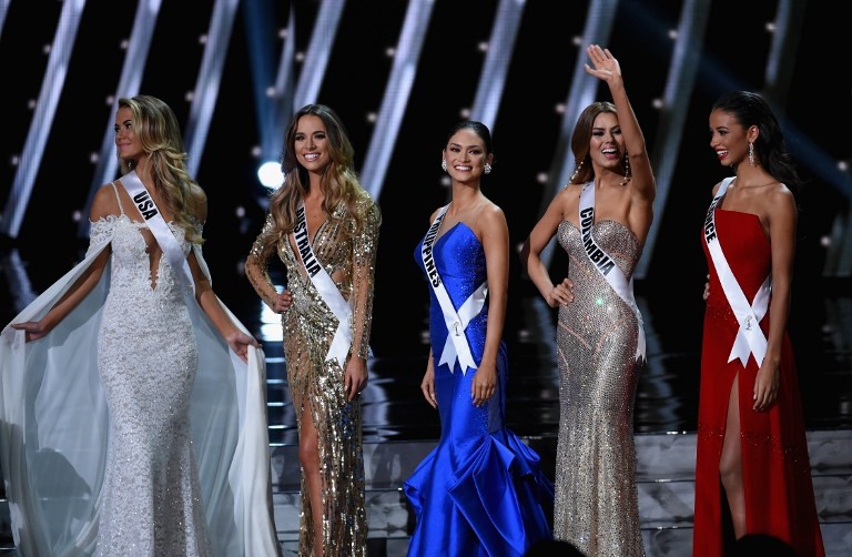 The top five finalists (L-R) Miss USA 2015, Olivia Jordan, Miss Australia 2015, Monika Radulovic, Miss Philippines 2015, Pia Alonzo Wurtzbach, Miss Colombia 2015, Ariadna Gutierrez Arevalo, and Miss France 2015, Flora Coquerel, stand onstage during the 2015 Miss Universe Pageant at The Axis at Planet Hollywood Resort & Casino on December 20, 2015 in Las Vegas, Nevada. Wurtzbach went on to be crowned the new Miss Universe.  AFP FILE PHOTO