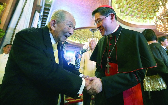 TWO EMINENT Filipinos. Luis Antonio Cardinal Tagle greets Washington Sycip.