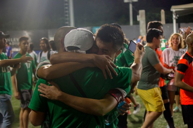 PLAYERS from the green side celebrating after their win against Ateneo 