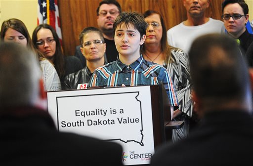 In this Jan. 29, 2016 photo, Thomas Lewis, an 18-year-old transgender student at Lincoln High School in Sioux Falls, S.D., speaks during a press conference in Sioux Falls against legislation that groups have said would discriminate against transgender people. South Dakota would be the first state in the U.S. to approve a law requiring transgender students to use bathrooms and locker rooms that correspond to their sex at birth if the governor signs a bill passed Tuesday, Feb. 16, 2016, by the state Senate. Lewis said the Legislature's passage of the bill is "shocking.  (Joe Ahlquist/Argus Leader via AP)  NO SALES