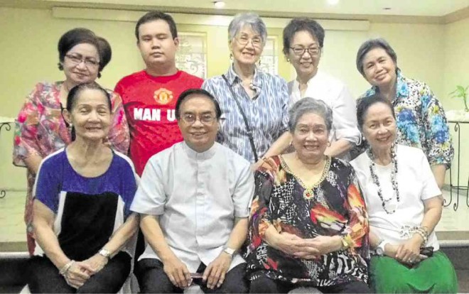 SAN Lorenzo GlobalMinistry chair Fr. Erno Diaz (seated center) with other officers, Flora Libay and Emily Luna and president Erlinda Chincuanco. Standing at center is VP Gerry T. Osias, and Pilar Caluag, Tita Dizon, Macky Martinez and Sonia Atabug.