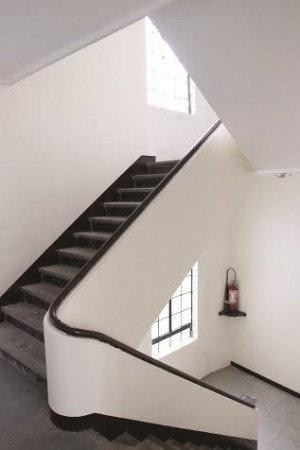 MODERN Art Deco stairs have been retained and restored.