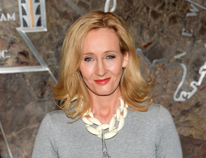 FILE - In this April 9, 2015 file photo, "Harry Potter" author J.K. Rowling lights the Empire State Building to mark the launch of her non-profit children's organization Lumos, in New York. Scholastic Inc. announced Wednesday, Feb. 10, 2016, that a script book of Harry Potter and the Cursed Child will be published July 31. The book is a based on the two-part stage collaboration of Rowling, Jack Thorne and John Tiffany and arrives just after the play premieres in London July 30. (Photo by Evan Agostini/Invision/AP, File)