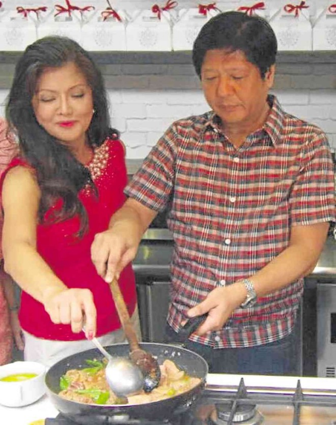 SEN. BONGBONG Marcos cooks, with a little help from his sister, IlocosNorte Gov. Imee Marcos. CONTRIBUTED PHOTO