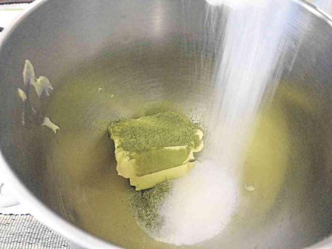 PREHEAT oven to 350°F. Line several cookie sheets with baking parchment. Set aside. In a small bowl, combine all-purpose flour and salt. Set aside. Using an electric mixer, fitted with a paddle/flat beater, cream together butter, green tea, sugar and vanilla.
