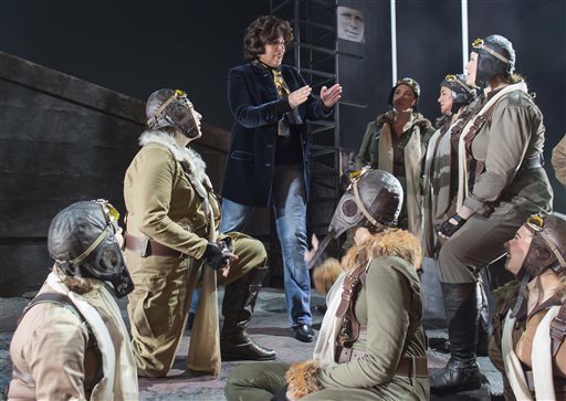 This undated image released by the Washington National Opera shows Director Francesca Zambello speaking to the Valkyries, warrior maidens who in this production are dressed as modern-day airmen, during an onstage rehearsal for Wagner's "Ring" cycle at the Washington National Opera. Zambello will direct Richard Wagner's Ring Cycle at the Kennedy Center from April 30-May 22. (Scott Suchman/Washington National Opera via AP)
