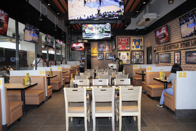 Enjoy delicious wings and your favorite beers while watching exciting sports shows at the new Buffalo Wild Wings at Uptown 