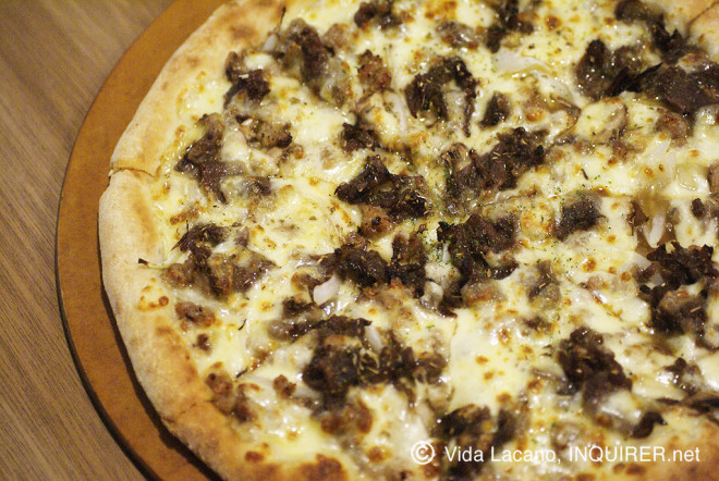 Mr. Pizza's BULGOGI PIZZA: True to the original taste of this staple Korean dish. Photo by Vida Lacano