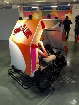 A STUDENT (partly hidden) prepares to test-drive a pedicab pimped-up by Taiwan-based artist Michael Lin. PHOTOS BY CATHY CAÑARES YAMSUAN