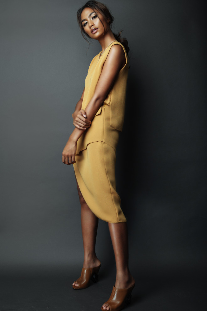 CREPE sleeveless top and crepe asymmetrical skirt in mustard; brown slip-on booties, Charles & Keith