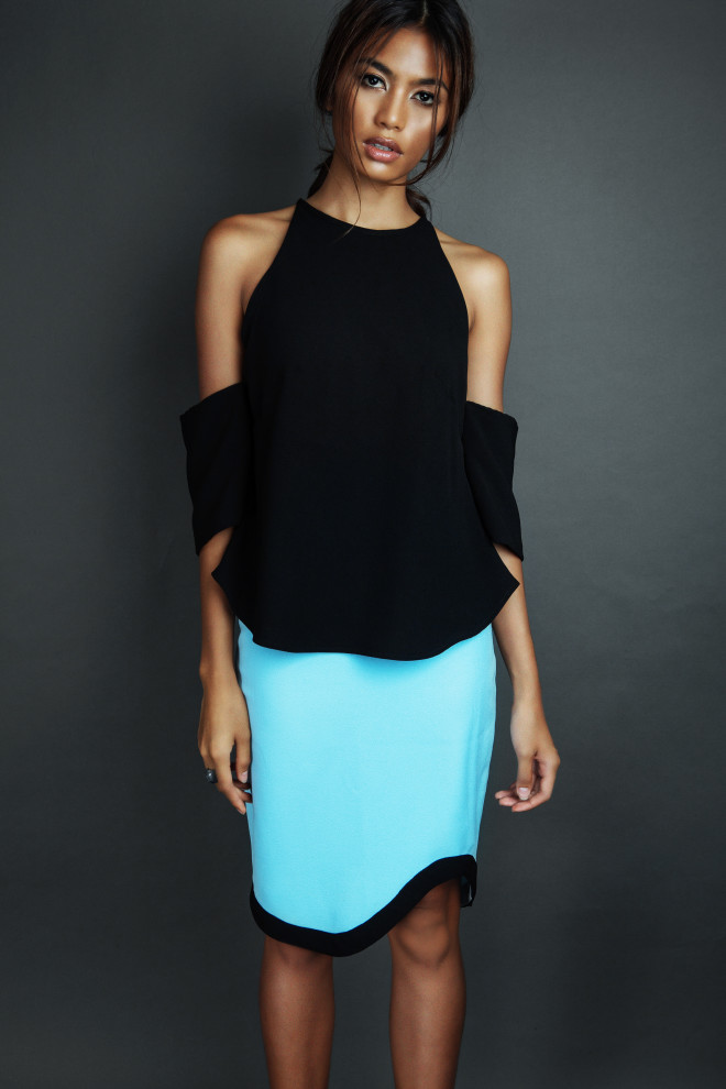 OPEN shoulder frilled top in black; high-waist curvature skirt in Light Blue