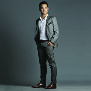￼Raymund wears a custom-made suit, a shirt by KADA CLOTHING, and double monk strap shoes by TO BOOT NEW YORK Photo by: Mark Nicdao