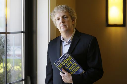 Author Steve Hamilton poses at the Metro Detroit Book and Author Society luncheon on Monday, May 16, 2016, in Livonia, Mich. Hamilton's latest Nick Mason novel, "The Second Life of Nick Mason," will be released on Tuesday. AP 
