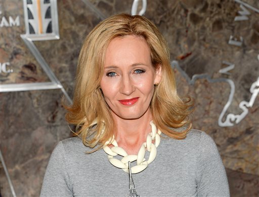 FILE - In this April 9, 2015 file photo, "Harry Potter" author J.K. Rowling lights the Empire State Building to mark the launch of her non-profit children's organization Lumos, in New York. Rowling received a PEN award for her writing and for her humanitarian work. Speaking Monday night, May 16, 2016, before hundreds gathered for PEN Americas annual gala at the American Museum of Natural History, the Harry Potter author noted that she opposed a recent petition calling for banning the presumptive Republican presidential nominee, Donald Trump, from entering the United Kingdom, saying such actions endangered everyones rights.  (Photo by Evan Agostini/Invision/AP, File)