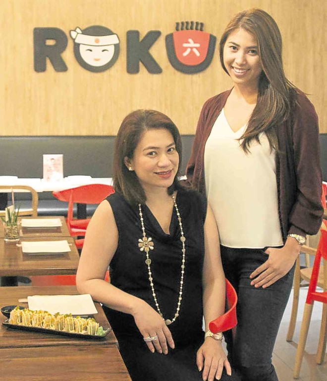 RESTAURATEUR Sheila Romero and her daughter Mikaela PHOTO BY ALEXIS CORPUZ