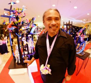TOYM Imao, the late National Artist's son and an artist in his own right, with his diorama sculpture depicting his father's artistic journey DEXTER R. MATILLA