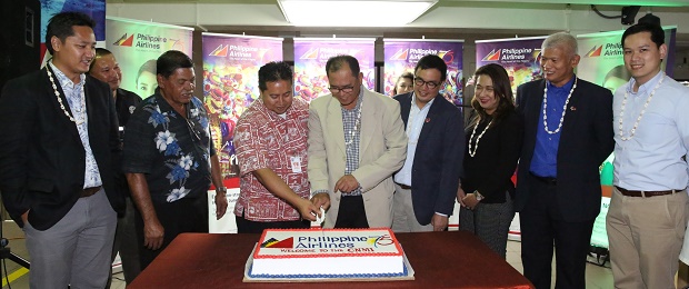 A cake-cutting ceremony marks the arrival of Manila-Saipan inaugural flight. INQUIRER.net