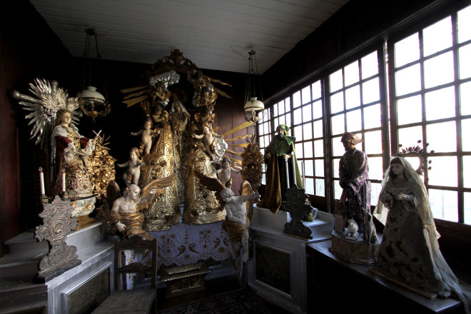 DEZ Bautista’s roomful of glittering religious icons