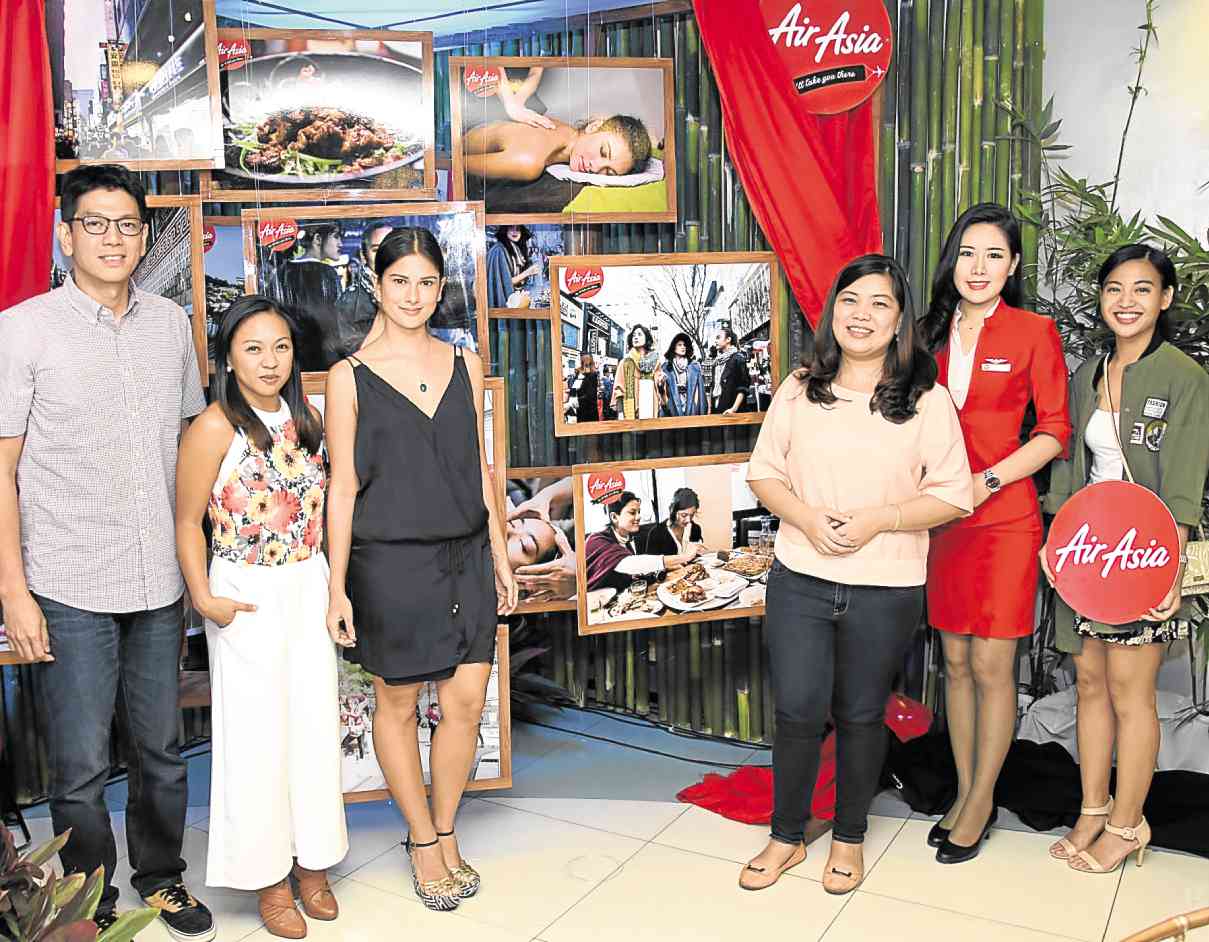 Philippines AirAsia's Commercial Head Gerard Penaflor, Marketing Manager for Korea Len Caccam, Health and fitness advocate Bianca King, Philippines AirAsia CEO Joy Cañeba, AirAsia's Korean Cabin Crew and marketing officer Clarieanne Aguilar.  