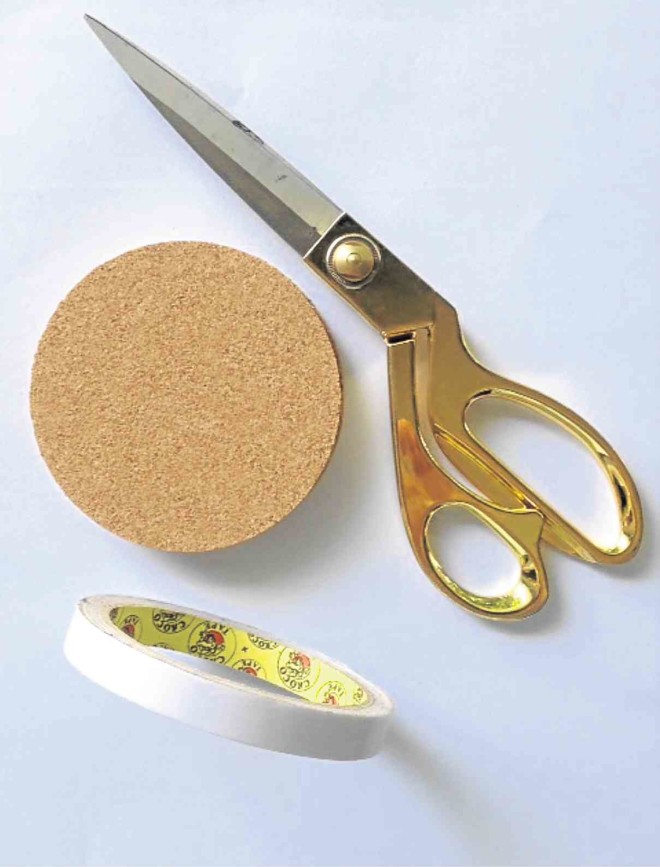 Scissors, round cork coaster (from Crate & Barrel), double-sided tape and white “cartolina” 