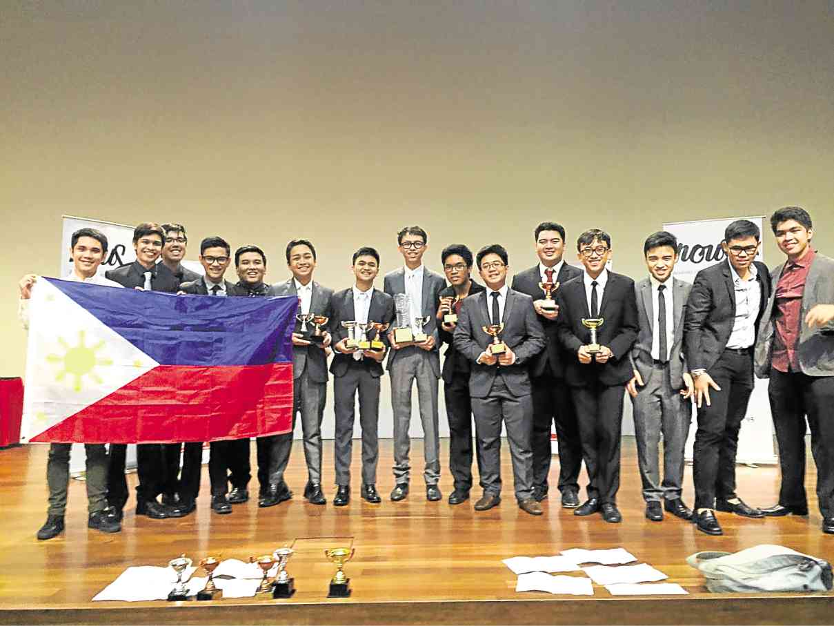 THE ASIAN Champions and Ateneo High School contingent with their trophies and awards after the grand finals