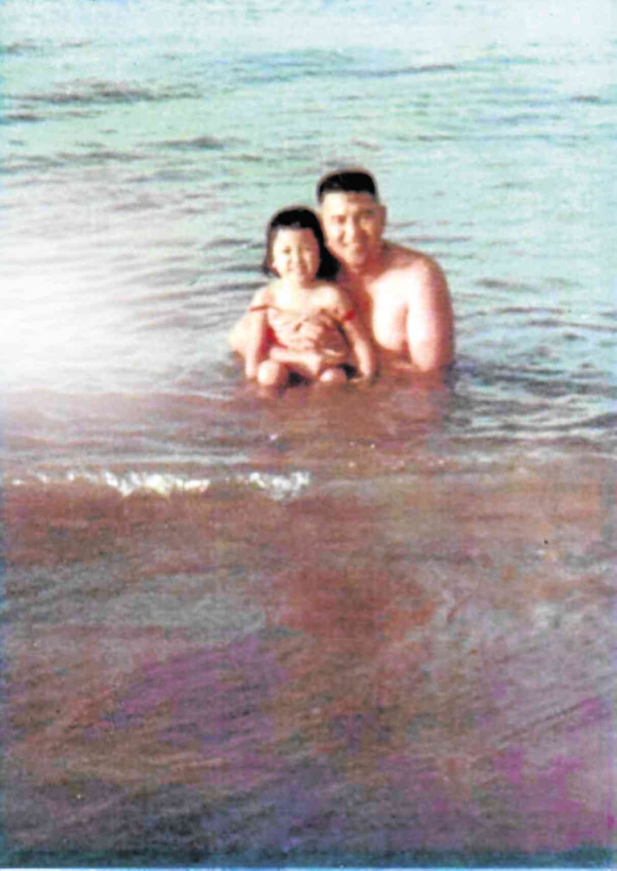 THE AUTHOR at age 4 and her father in La Union