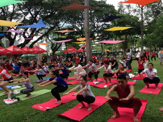 DOING ‘asana’‘ at Ayala Triangle Gardens. PHOTOS BY ALYA B. HONASAN