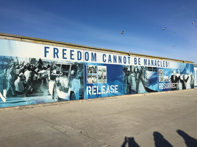 PEOPLE’S STORY. FREEDOM wall greets visitors on Robben Island.