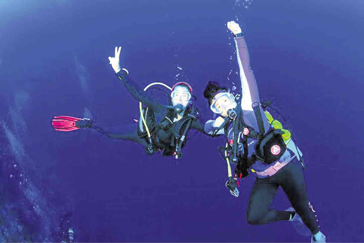 HAPPY divers: The author (left) with PCSSD’s Karen Chan BETHWATSON