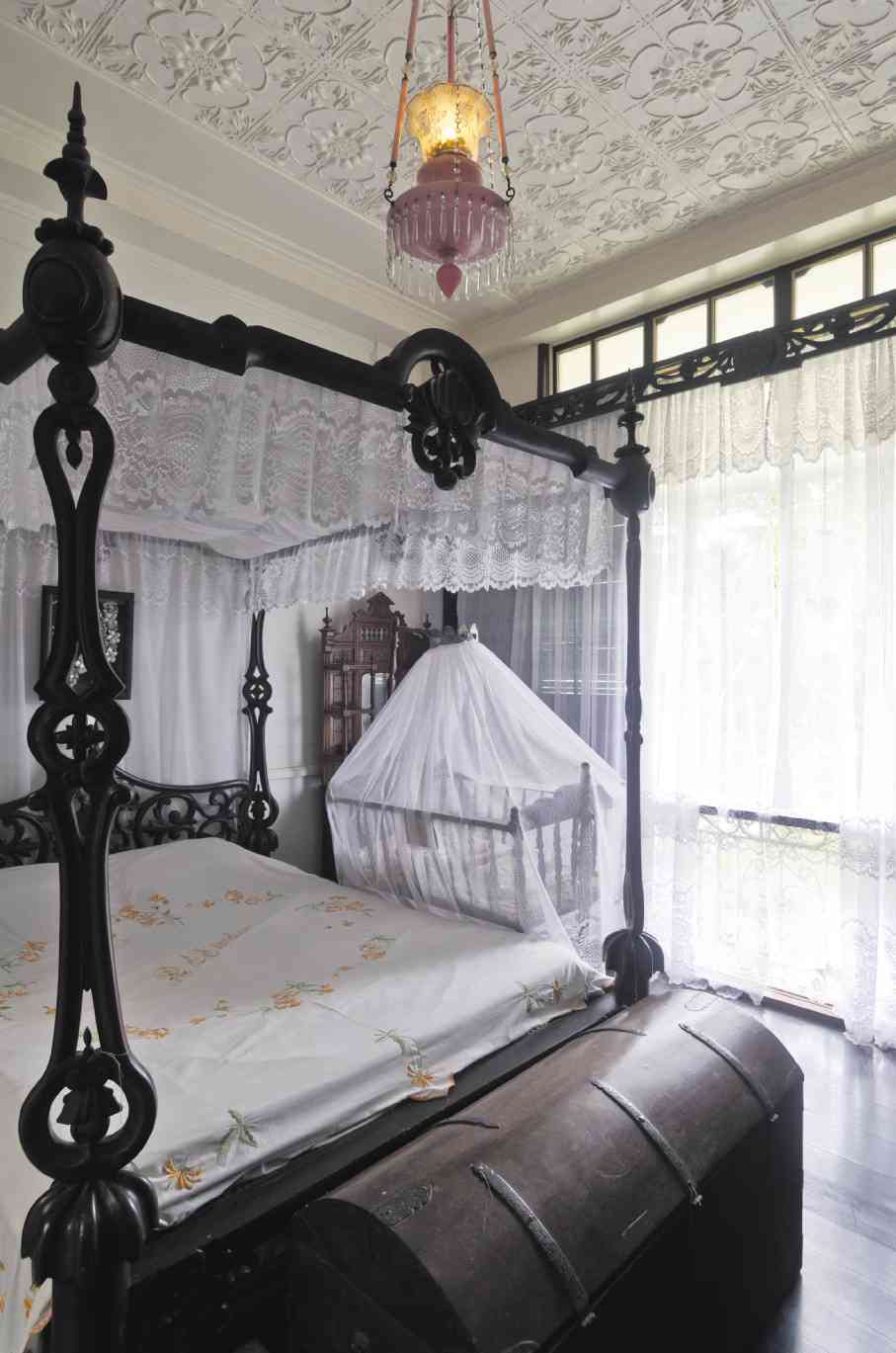 CARVED four poster bed with finials by famous Chinese maker Ah Tay