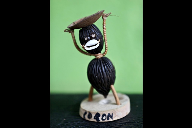 "Seed Man" figures made from large seeds, seashells and other natural materials at the Coron Souvenir Shop