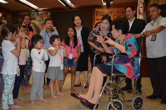 HELENA Benitez during the recent Sayaw festival, interacting with children