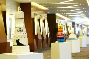 The hallway was lined with multi-tiered cakes, each one designed and carefully crafted by the hotel’s award-winning pastry chefs. 
