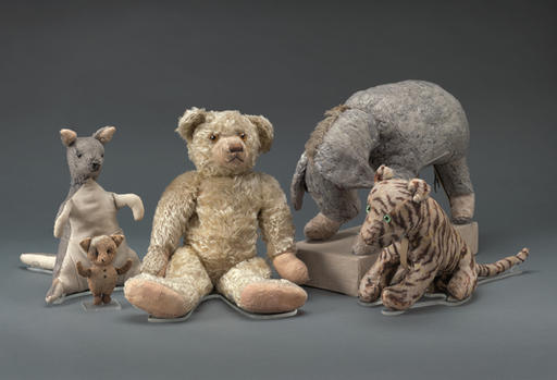 This July 2016 photo provided by the New York Public Library's Digital Imaging Unit shows Winnie-the-Pooh and friends original stuffed toy animals in New York after their restoration. After more than a year of much needed repairs by a textile conservator, they went back on display Wednesday Aug. 3, 2016 at the New York Public Library where they've resided since 1987. (New York Public Library's Digital Imaging Unit/Pete Riesett and Steven Crossot via AP)