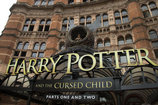 FILE - This July 30, 2016 photo shows the Palace Theatre in central London which is showing a stage production of, "Harry Potter and the Cursed Child." The script “Harry Potter and the Cursed Child Parts One and Two” sold more than 2 million print copies in North America in its first two days of publication, Scholastic announced Wednesday, Aug. 3.  (Photo by Joel Ryan/Invision/AP, File)