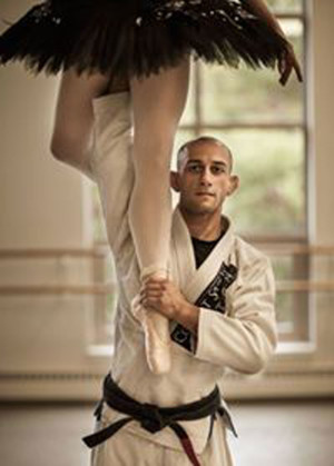 BIRKADZE is certified to teach the art of classical partnering. His upper body strength in this one-arm lift is the result of martial arts training.
