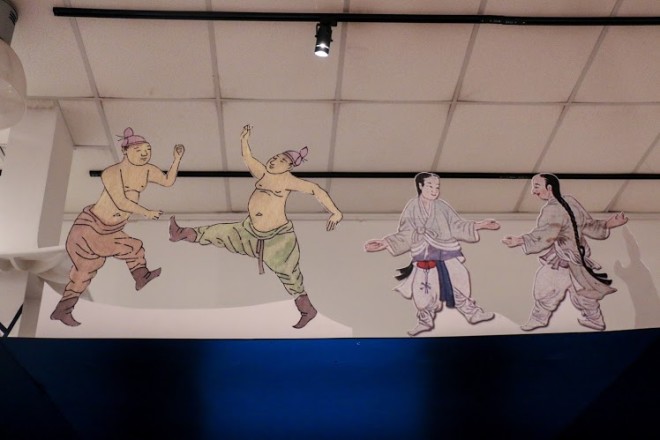 LLUSTRATIONS of men engaged in bare hand martial arts during the Joseon era.