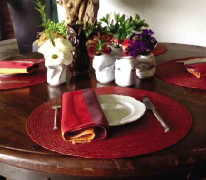 GROUPED together, the “vases” can add an industrial feel to the dinner table.