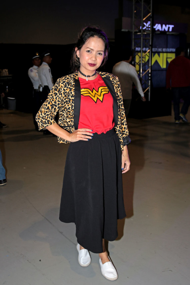 GALE Hermano Dy in Wonder Woman tee, maxi skirt and cheetah prints