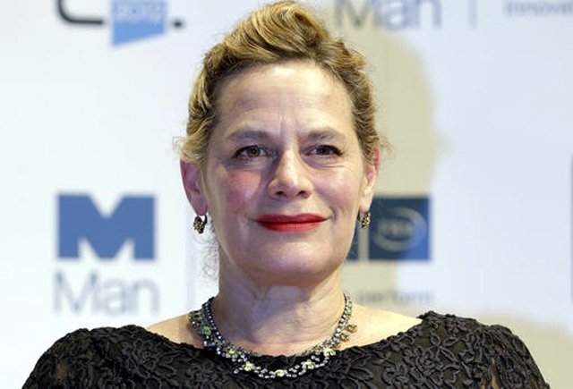 In this Monday, Oct. 15, 2012 file photo, author Deborah Levy, shortlisted for the Man Booker Prize, poses for photographers, during a photo call at the Royal Festival Hall, in London. AP