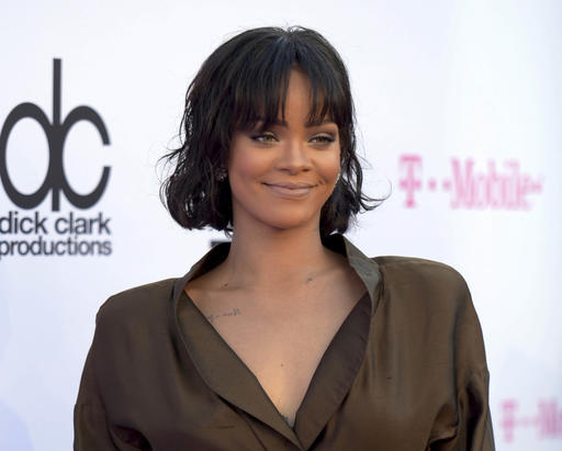In this May 22, 2016 file photo, Rihanna arrives at the Billboard Music Awards in Las Vegas. Rihanna says her new collection for Puma was inspired by Japanese street culture. The pop star launched the autumn/winter 2016 Fenty Puma by Rihanna line on Tuesday, Sept. 6, 2016 at Foot Locker in New York City. AP
