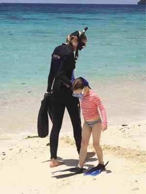 MOTHER and daughter get ready to snorkel in scenic El Nido’s protected waters.