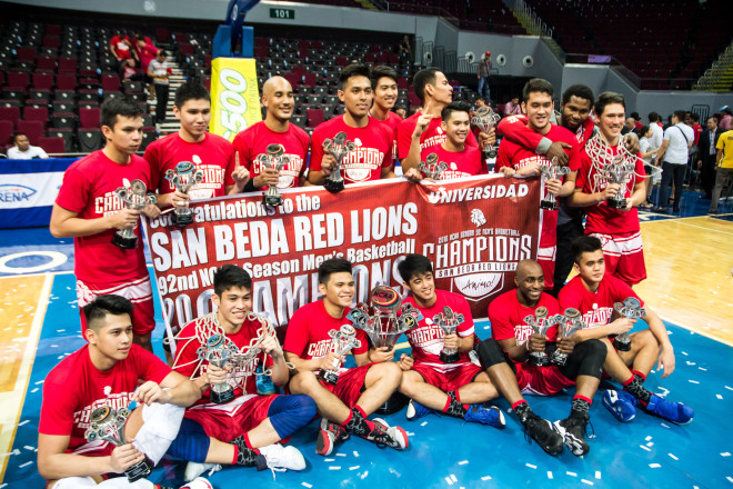 The San Beda Red Lions proudly shows off their championship trophies —EJ BONAGUA
