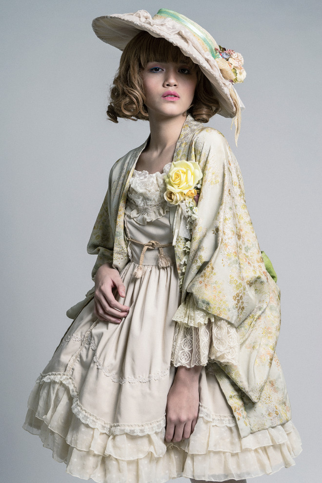 Honey-colored hair, flowers, bows and pastel shades of Victorian era-inspired apparel